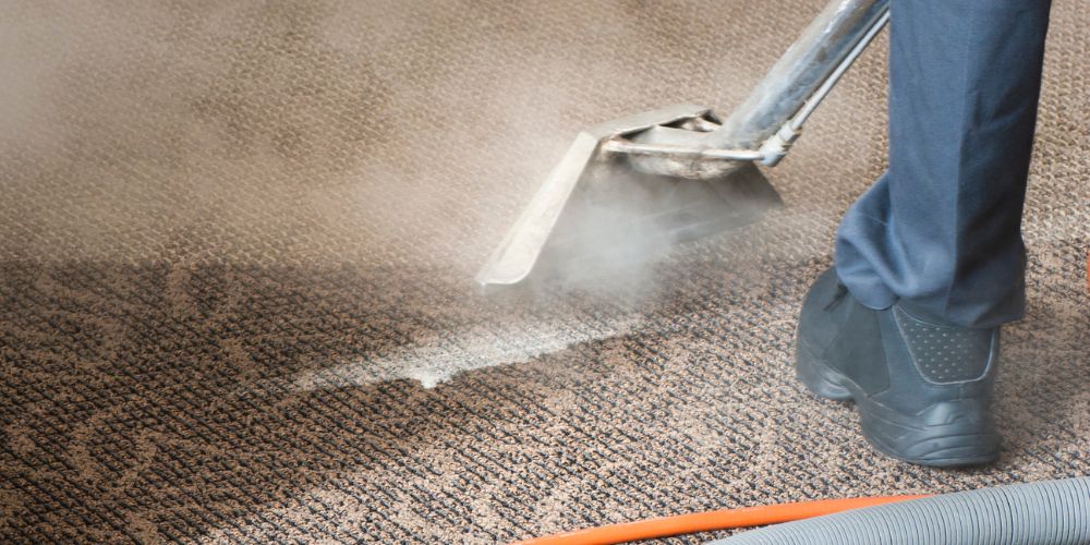 Commercial carpet flooring being professionally cleaned